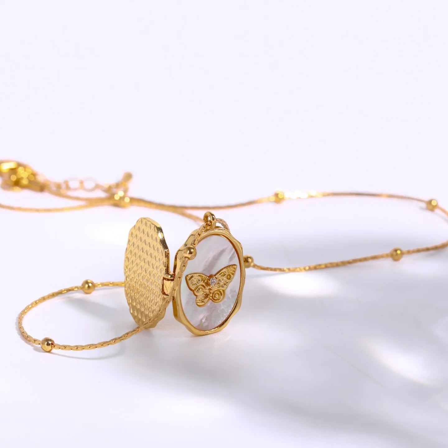 Collar mariposa