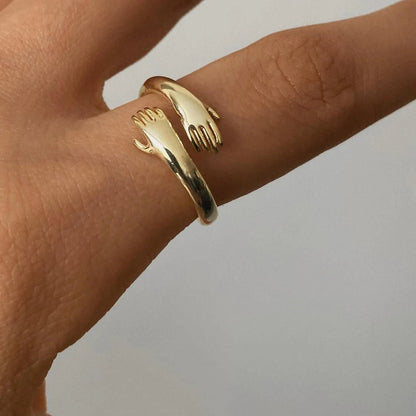 Anillo ajustable abrazo dorado