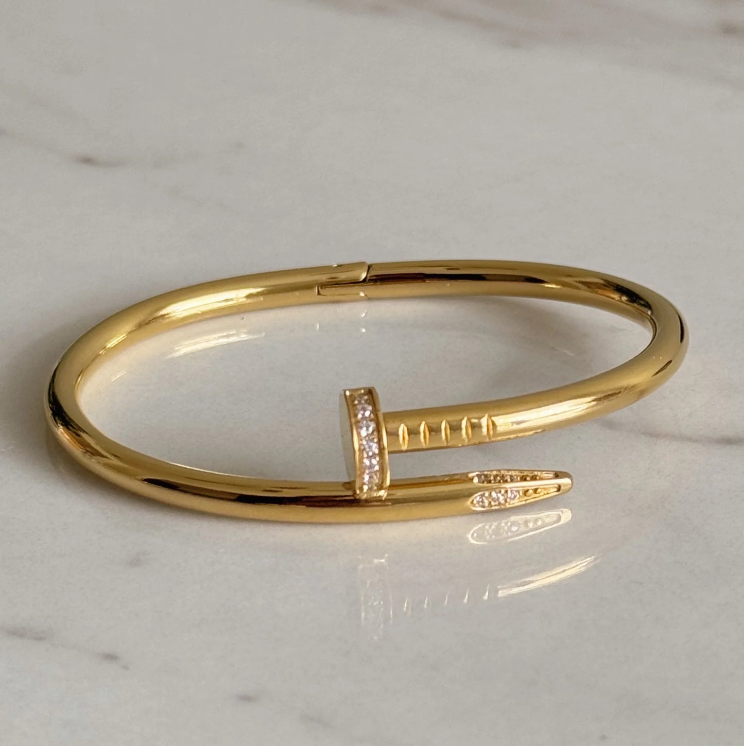 Pulsera clavo dorado