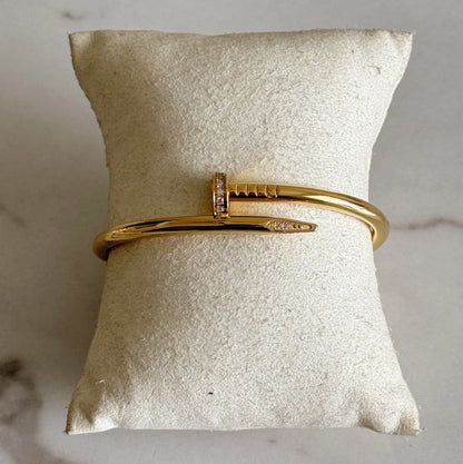 Pulsera clavo dorado