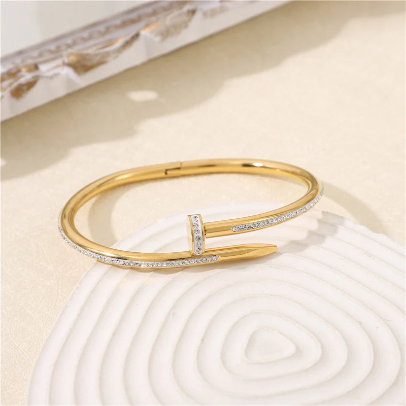 Pulsera clavo dorado glam