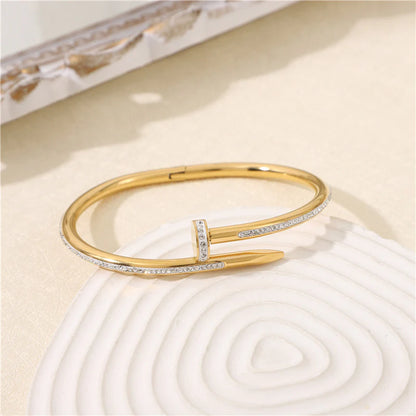 Pulsera clavo dorado glam